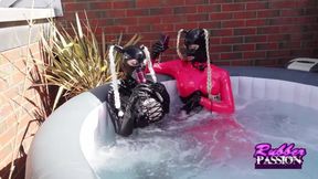 Lesbian Latex Lovers Sizzle in the Hot Tub