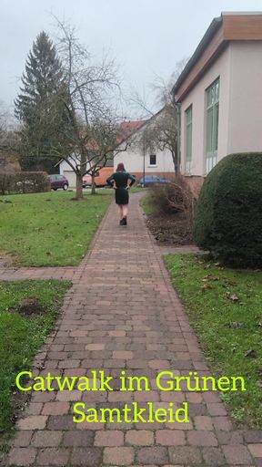 Catwalk in a green velvet dress.