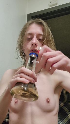 Trans man smokes topless