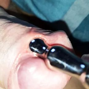 Penis plug after precum and foreskin play