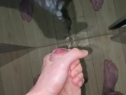 A young guy jerks off in front of the mirror and sweetly moans and cums