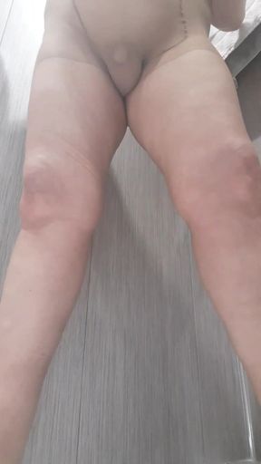 Peing in tights in shower
