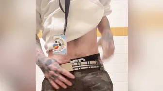 Skinny twink strokes his big white cock in risky public bathroom stall