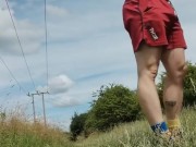 Stripping naked in a field