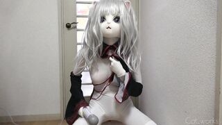 White crossdresser cat wears asian vampire costume and mittens