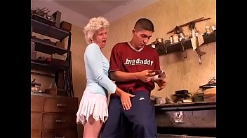 Old and scened whore in white lingerie takes a young cock deep inside her
