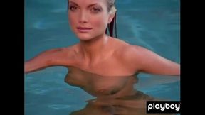 Big boobed blondie Kimberly Holland taking off her sexy uniform outdoor