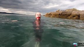 Ocean Rope Bondage with Ballgag in Wetsuit