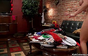 Busty redhead slave toyed in threesome
