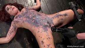 Redhead in bondage gets waxed