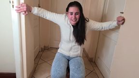 Brunette Slut Desperately Needs to Piss, Pisses in Her Blue Jeans
