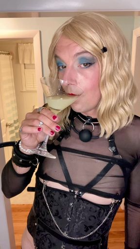 Sissy drinks her own cum from a martini glass