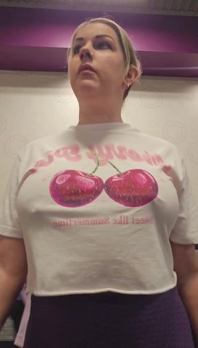 Busty MILF works out on a treadmill