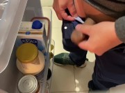 Refreshing Asian cock in front of fridge with a hot handjob