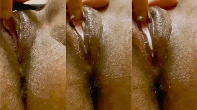 Thick ebony licks her fat clit with a creamy gushing pussy