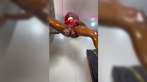 Sexy ebony girl fucks her pussy with a big dildo and squirts from overwhelming pleasure