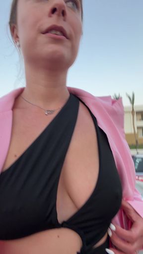Public flashing of erect nipples with a nipple piercing