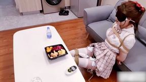 ADM68-Asian girl, eating while bound by ropes, eating during a vibrating orgasm.