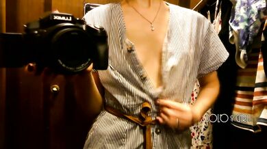 Slutty bitch can't hold back her lust and plays with pussy in fitting room, public masturbation