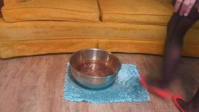 Fifi sinking red rubber flats into ankle deep melted gummies