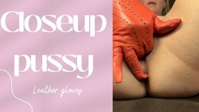 closeup leather glove pussy play