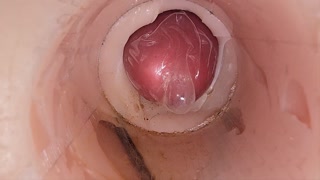 The camera in the deep pussy records a huge ejaculation of sperm into the condom