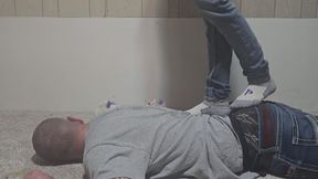 Chrissy jumping on Dan with socks