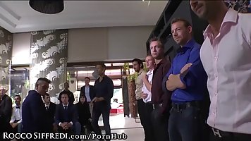 Astonishing women are having an orgy in their rich friend's house, while Rocco Siffredi is watching