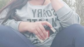 Nicki Pie smoking in the woods