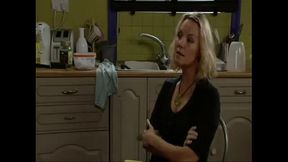 British actress Charlie Brooks as Janine Butcher with her fictional boy Ryan