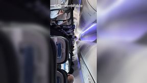 Her eager anticipation transforms to instant gratification mid-flight, sans modesty
