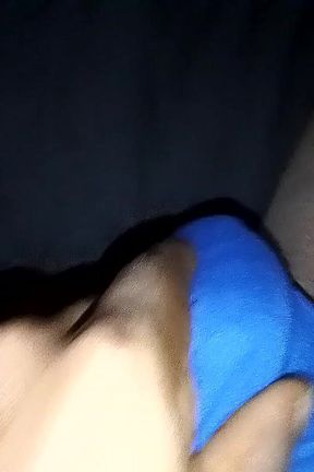 Wearing a Blue Panner Wear in the Hand of Yellow-colored Pen