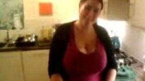 My BBW busty wife does kitchen work and shakes her big boobs