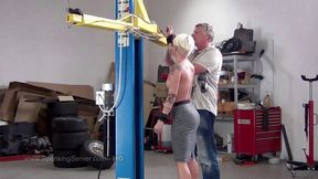 Cora,sexy blonde inked beauty gets bare back whip in the mechanic shop