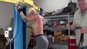 Cora,sexy blonde inked beauty gets bare back whip in the mechanic shop