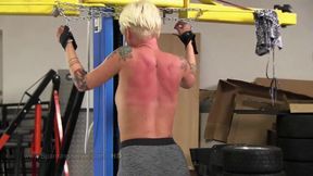 Cora,sexy blonde inked beauty gets bare back whip in the mechanic shop
