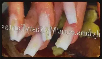 Goddess' Long Nails Tease with Banana and Oil