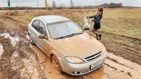 CAR STUCK Realtor Tanya is stuck in the mud