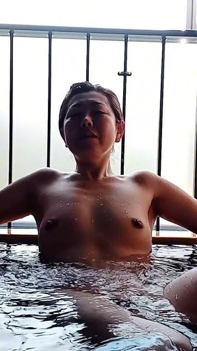 A Married Woman Taking a Bath in a Hotel Room