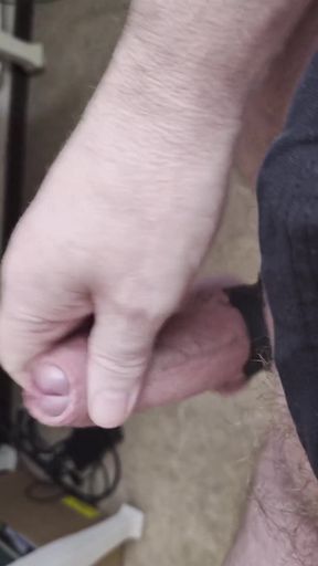 My Friend Sits in a Chair and Jerks His Cock While Watching the Video Until He Orgasms