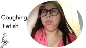 Coughing and massaging my throat