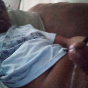 Black dick unleashes load solo on sofa