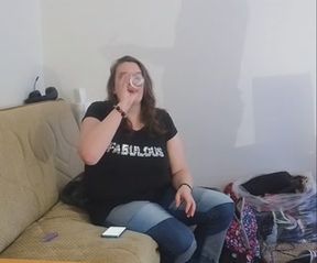 Layla drinks full glass of piss using a straw