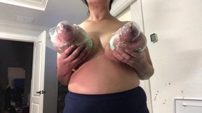 Huge Tits Wrapped in Plastic and Sucked