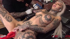 Tattooed Amber Luke strokes her big tits while getting inked!