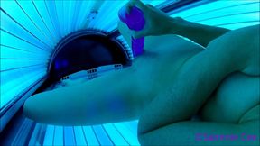 Tanning booth finger and dildo fuck