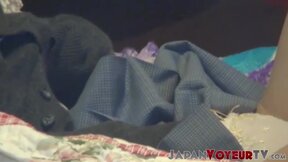 Japanese bitch plays with her hairy pussy on secret tape