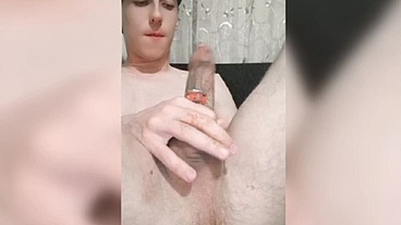 So hot twink enjoys a big anal ball and cums from a strap-on. His anal spits natural lube