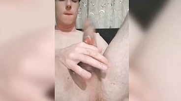 So hot twink enjoys a big anal ball and cums from a strap-on. His anal spits natural lube