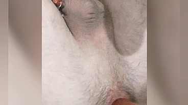 So hot twink enjoys a big anal ball and cums from a strap-on. His anal spits natural lube